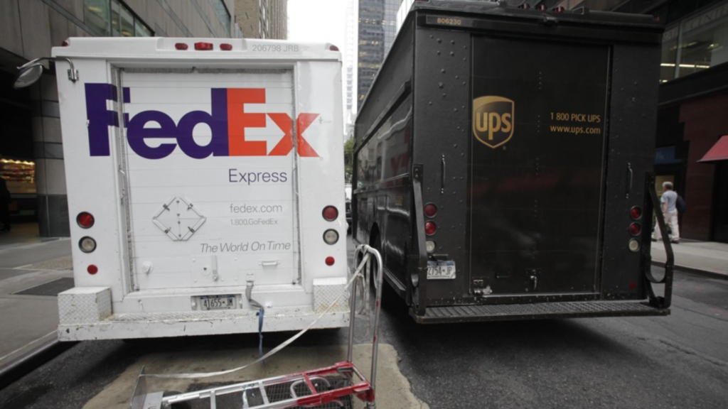 Image of the back of a FedEx and UPS delivery truck for a delivery truck accident